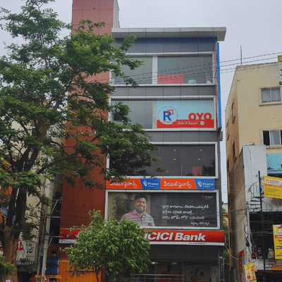 A commercial building in Hyderabad showcasing the fast-track construction work of Nice Design & nice Constructions.