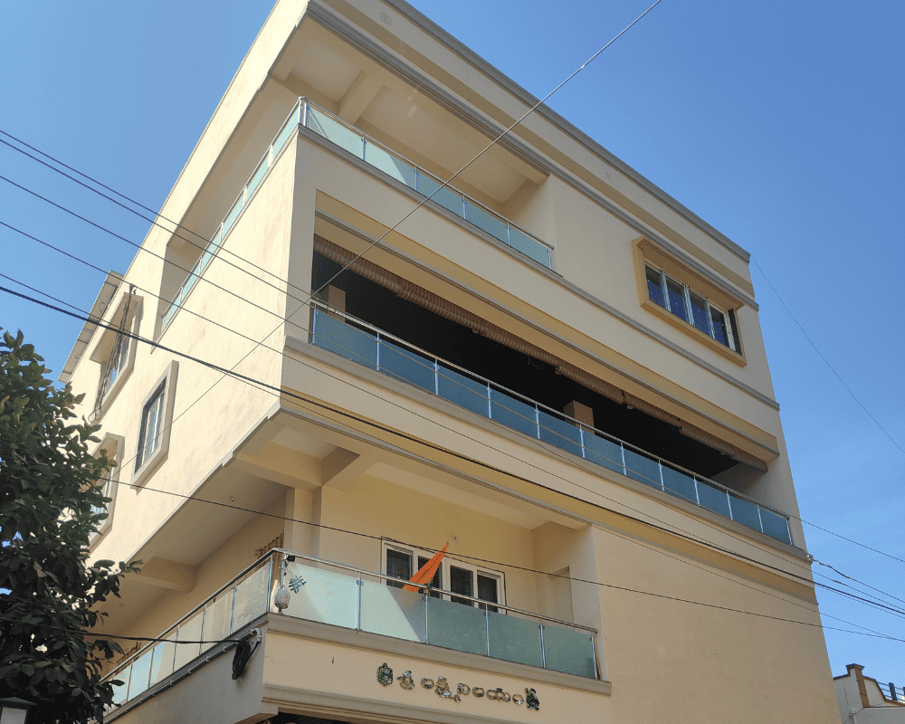 The completed Shri Laxmi Nilayam residential building in A.S. Rao Nagar, a 5BHK triplex house built by Nice Design & nice Constructions.